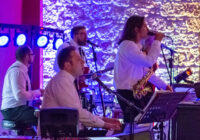 Band singing and playing