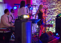 Band singing and playing