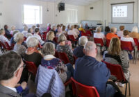 Hampton Court guide Sarah Slater relating history to our May 2024 audience.
